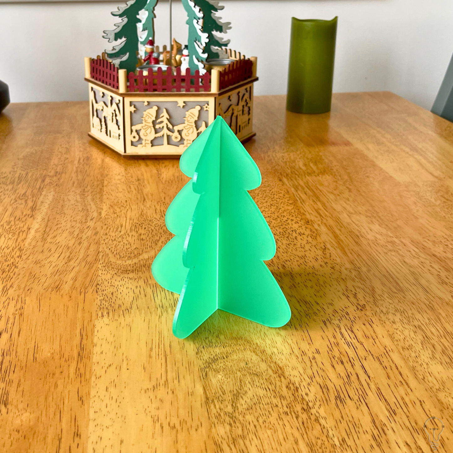 A beautifully designed laser-cut Christmas tree decoration, perfect for adding festive charm to your table, window sill, or mantel.